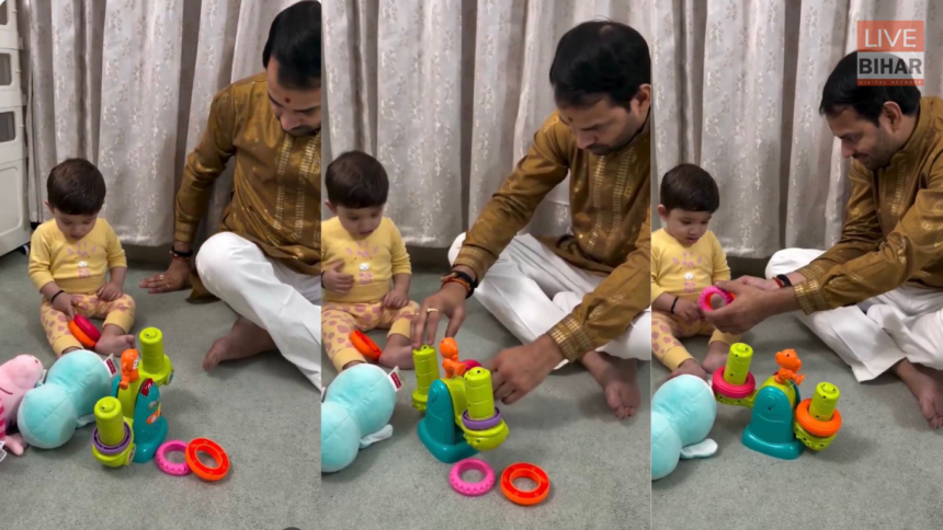 तेज प्रताप यादव इराज के साथ खेलते हुए